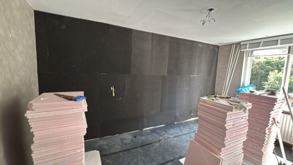 Wand buren geluidsoverlast