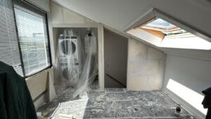 Zolder tussenwand trapgat achteraf