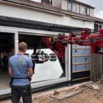 aanbouw tussenwoning plaatsen glas schuifpui