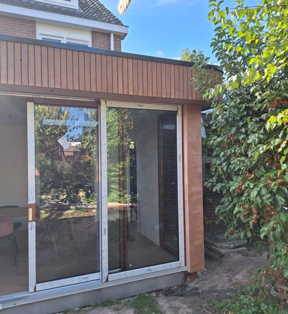 Inspiratie moderne aanbouw aan jaren 30 woning