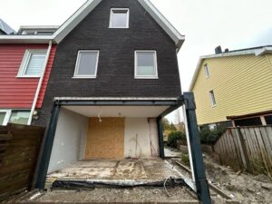 Aanbouw met geveldoorbraak achterkant en zijkant